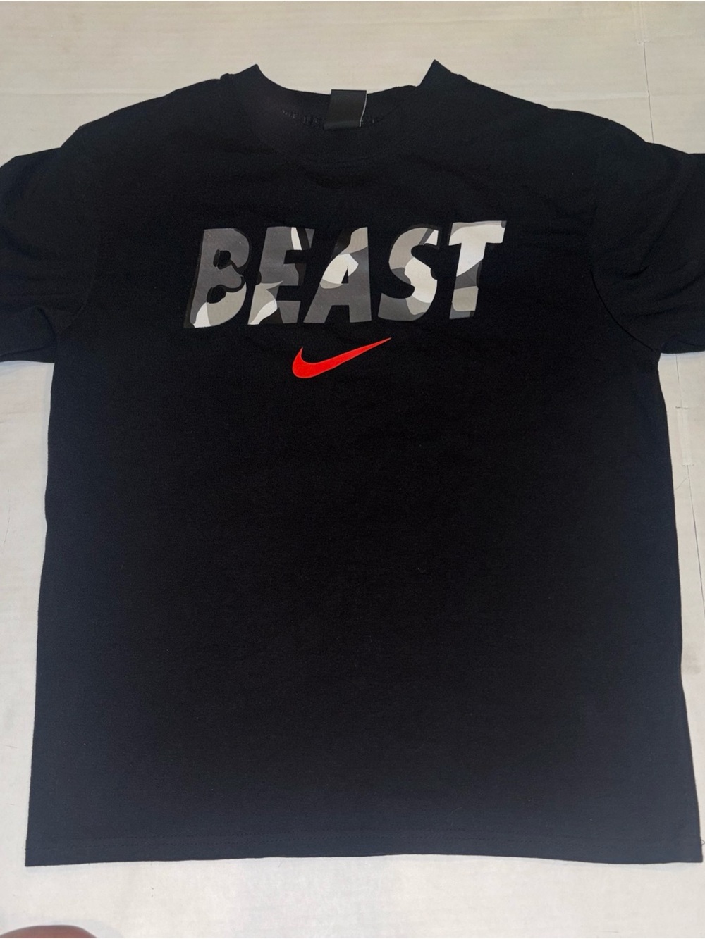 Nike Black 'BEAST' Graphic Short Sleeve Tee with Red Swoosh